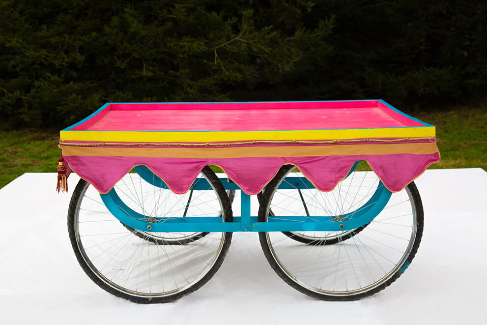 colorful cart use as a table for indian cerenomies