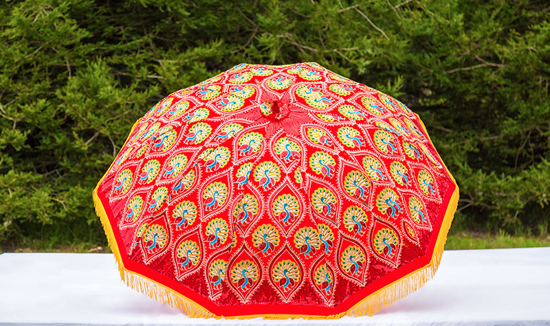Red umbrella for indian wedding decor