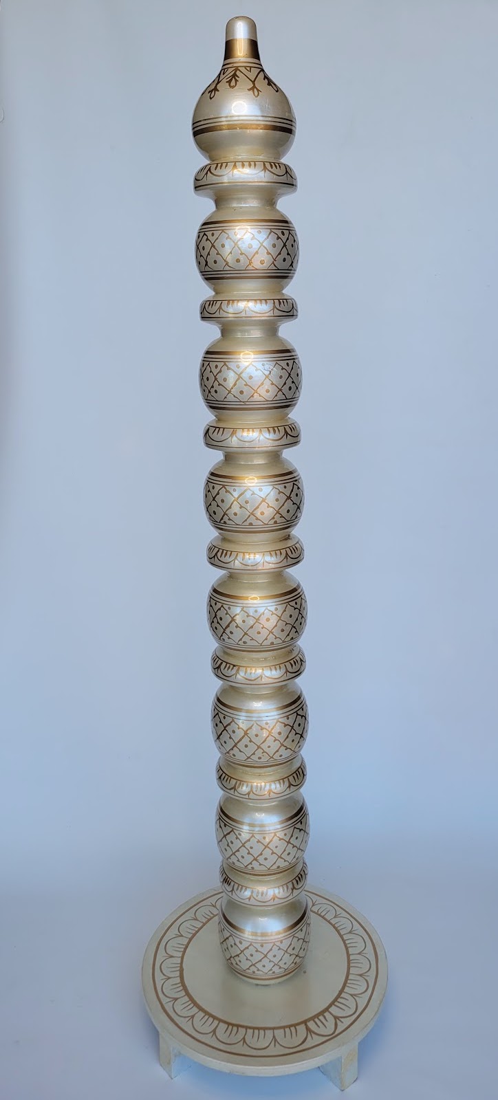 Tall White and Gold Pillar